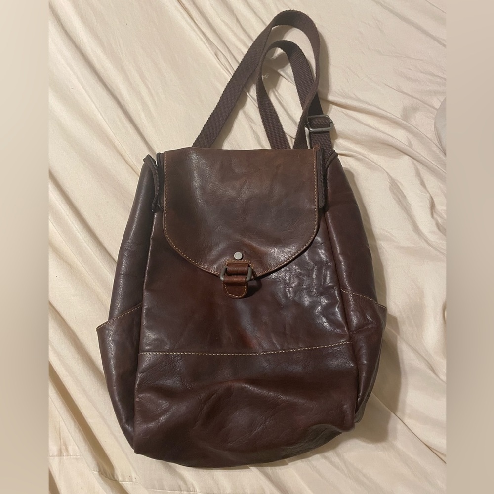 Used but great condition real leather mini backpack with zipper and magnet
